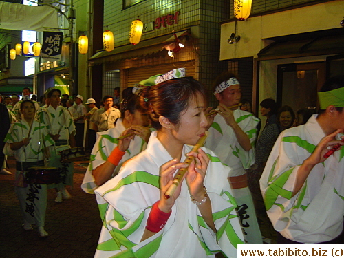 Bamboo flutes are part of the musical instruments used in the matsuri