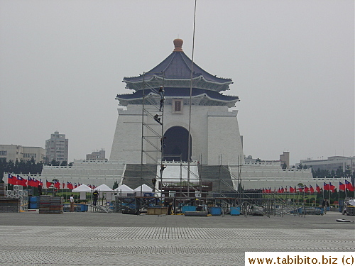 Construction workers in front of the Hall