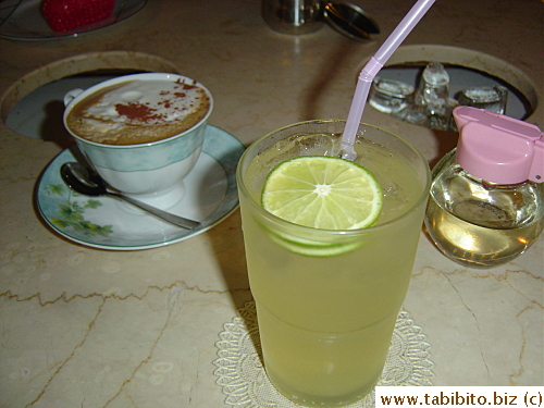 Our 3-o'clock drinks at a quiet little caf� inside the shopping center