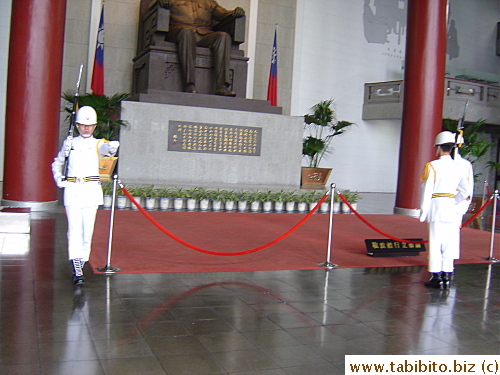 The guard on the left steps down to join the new ones