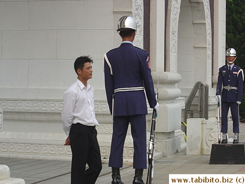 I caught this staff talking to the guard in a very low voice.  I know chatting is against the rule, but who could blame the latter?