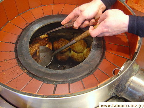 Pepper bread baked on the wall of this tandori style oven