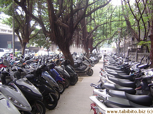 Scooter parking lot near the computer town