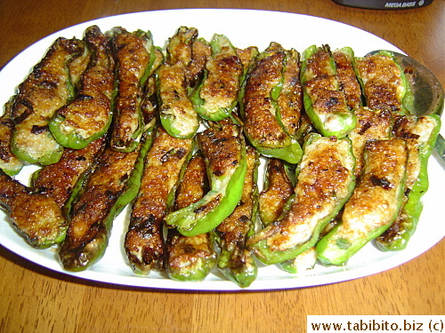 A plate of delicious stuffed peppers.  I only poured soy sauce on top for seasoning, other heavy sauces would mask the fresh seafood taste of the stuffing