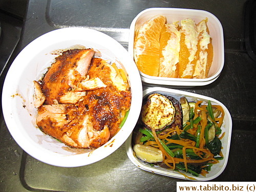 Cajun salmon, stirfried veggies, sauteed eggplant, orange